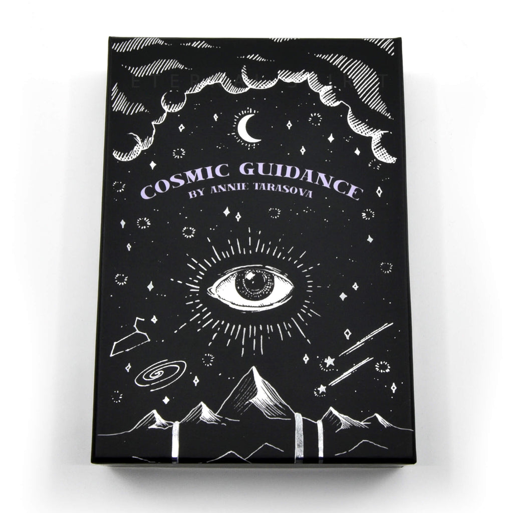 Book titled 'Cosmic Guidance' by Annie Parasova with celestial design on a white background